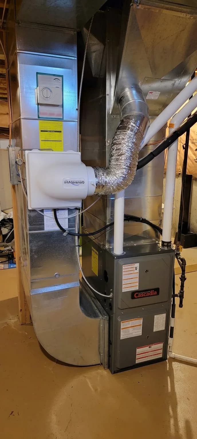 Furnace with steam humidifier and flex duct in a residential install.